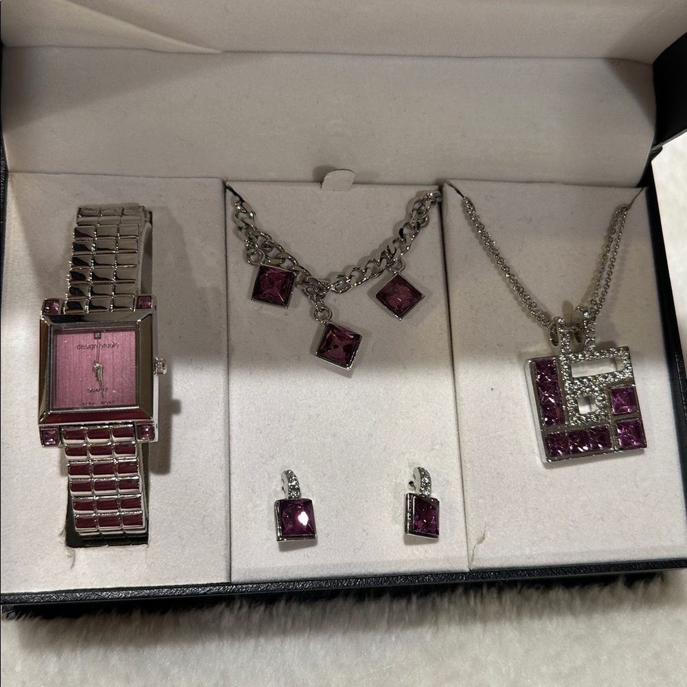 New in box. Design studio 4 piece set